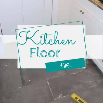See how we tiled our kitchen floors in our farmhouse kitchen renovation DomesticDeadline.com