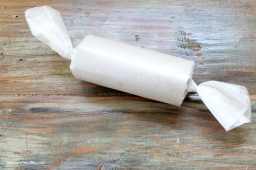 These easy DIY fire starters with dryer lint and toilet paper tubes are a great way to use things that would otherwise go in the trash. Wrapped in wax paper to ignite the fire