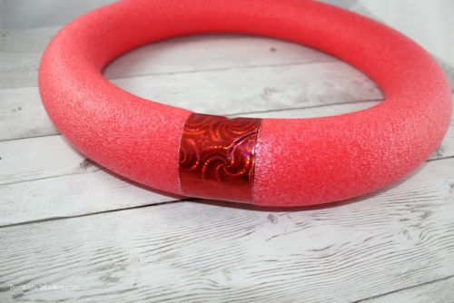 Tis the seas to stock up on pool noodles for DIY pool noodle wreath forms! At only $1 each, pool noodles make cheap and easy wreath forms for DIY wreaths. www.domesticdeadline.com