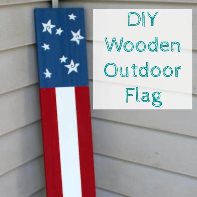 Leftover fence boards and chalk paint, turn into a simple outdoor wooden flag, perfect for Memorial Day, Flag Day, Independence Day or even all summer. http://domesticdeadline.com