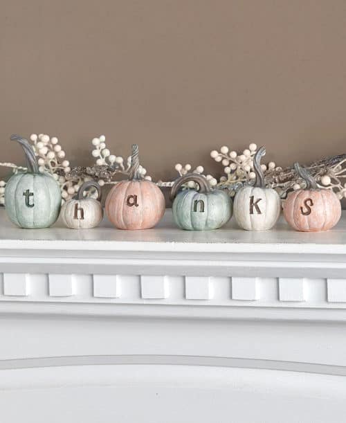 Use styrofoam carvable dollar store pumpkins to spell out your family name. DIY and customizable to go with any fall decor using chalk paint. www.domesticdeadline.com