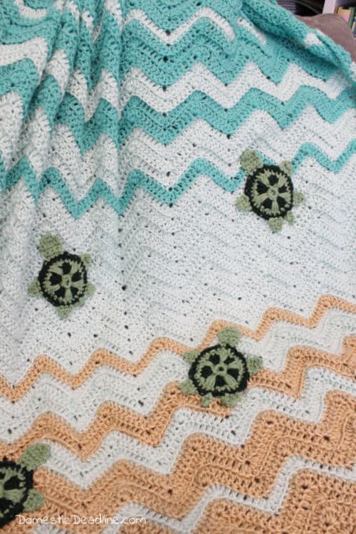 Using a ripple afgan and a "granny square" inspired turtle I created my version of a crocheted sea turtle blanket for the pinterest challenge. www.domesticdeadline.com