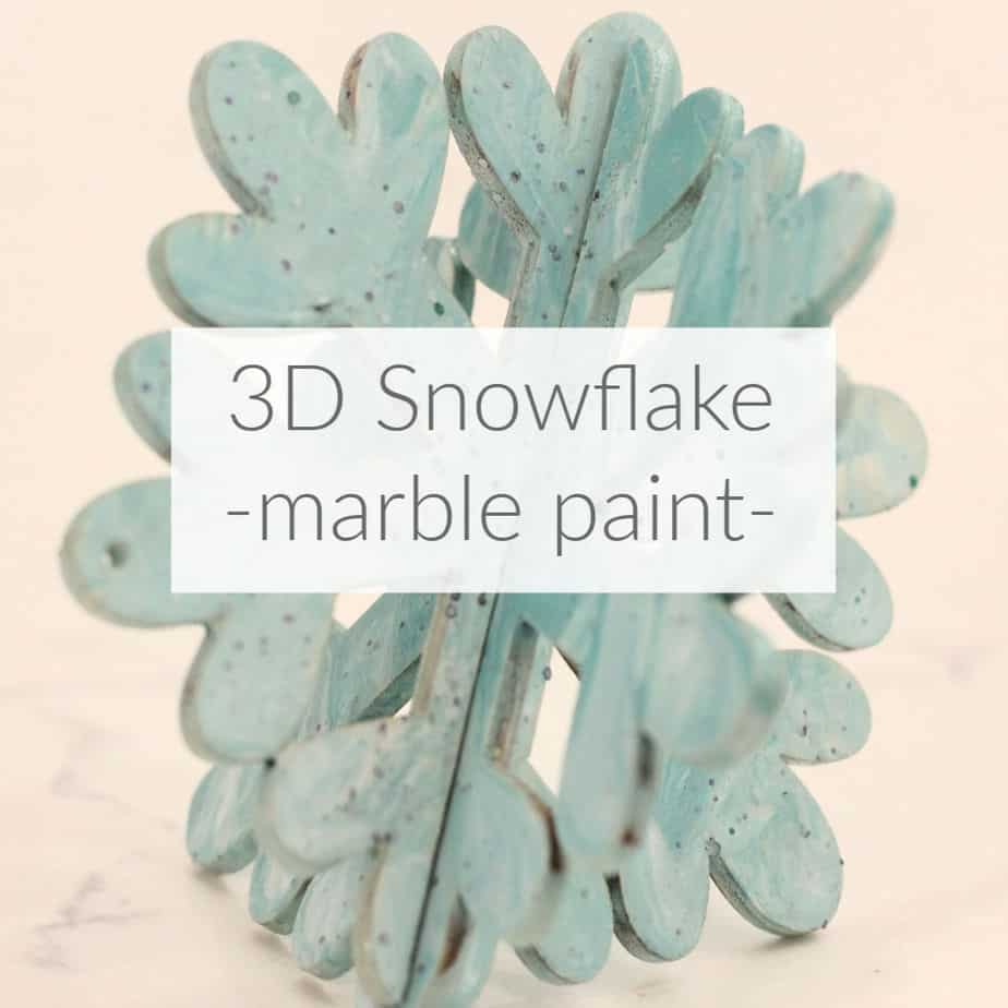 Learn how to use a pouring medium to make these 3D marble snowflake ornaments. Marble the colors of your choice with Deco Arts Pouring Medium and wooden snowflakes from Oriental Trading. DomesticDeadline.com