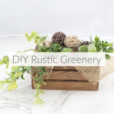 Find this easy DIY rustic greenery arrangement using craft supplies on hand or easily obtained from the dollar store. Plus more stash-busting projects. DomesticDeadline.com