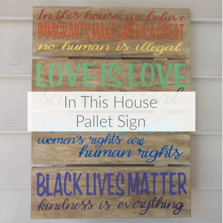 See what patriotisim means to me with my wood pallet hand painted "In This House" Cricut project. Grab a free printable version and more DomesticDeadline.com