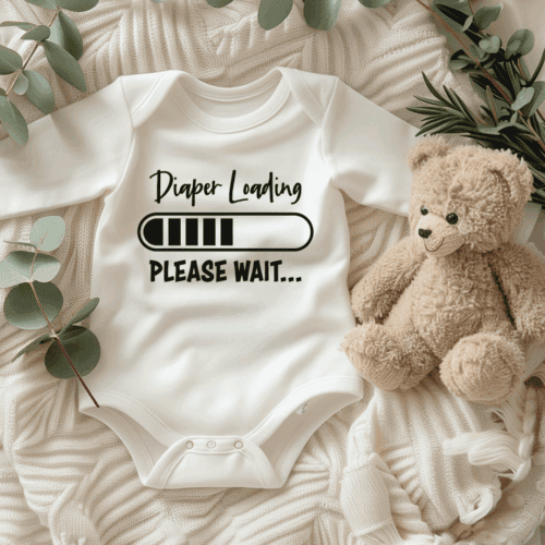 Free baby shower SVG! Grab this cute “Diaper Loading” onesie design for your next Cricut or Silhouette project.
