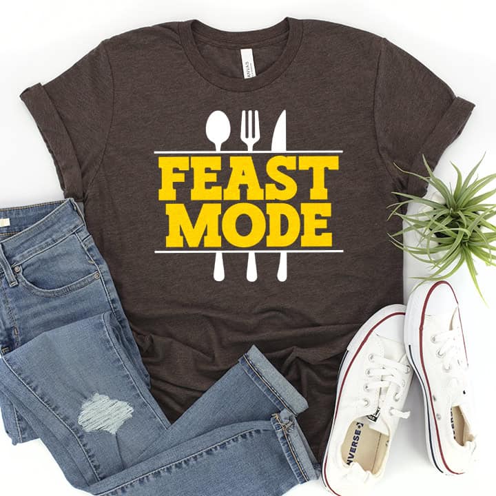 Free funny Thanksgiving SVG — Feast Mode Activated with turkey leg, football laces, and power button. Perfect for Cricut or Silhouette Thanksgiving crafts.