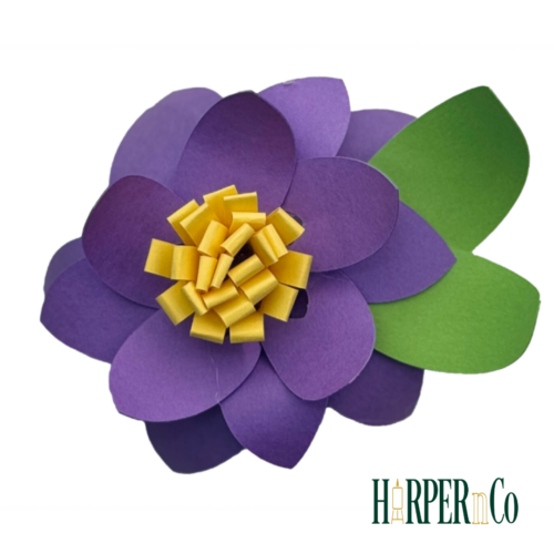 Layered 3D paper flower made from cardstock with curled petals and leaves