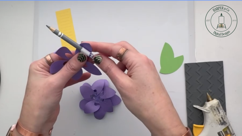 Curling petals on the smallest layer of a layered 3D paper flower