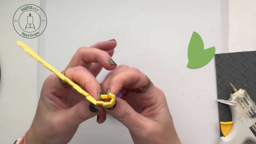 Finished paper flower center ready to attach to a layered 3D paper flower