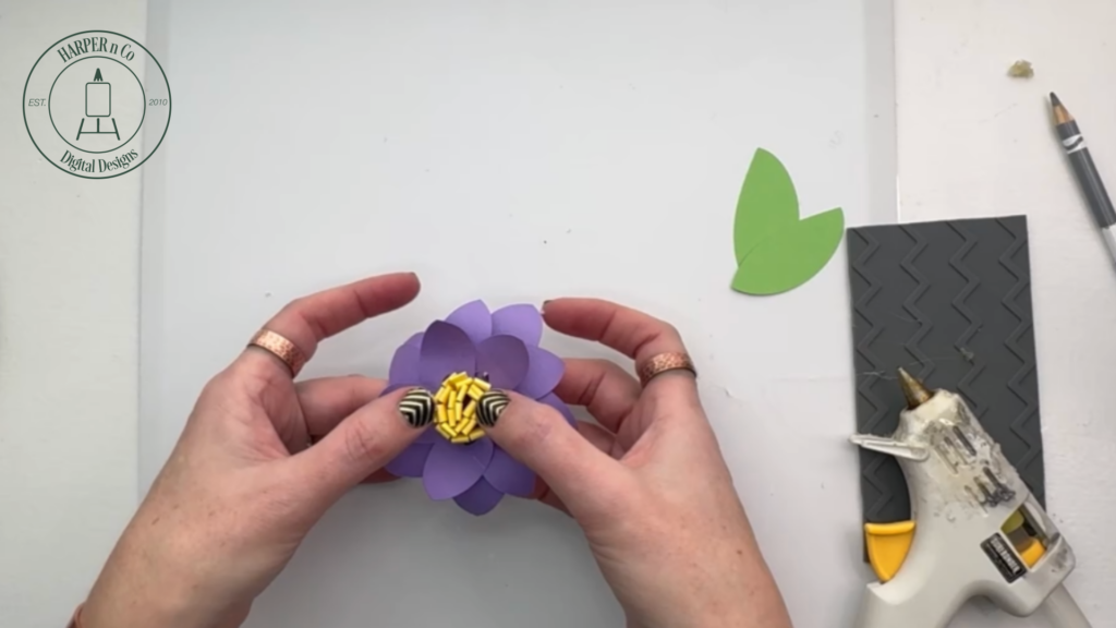 Gluing the center into the middle of a layered 3D paper flower