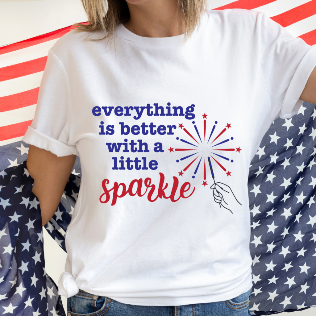 Free patriotic SVG file featuring "Everything is Better With a Little Sparkle" with sparkler graphic in red and blue, perfect for Cricut and Silhouette.